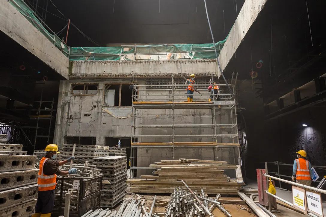 Construction of the reinforced concrete wall in progress at the platform level of Raja Uda MRT Station.