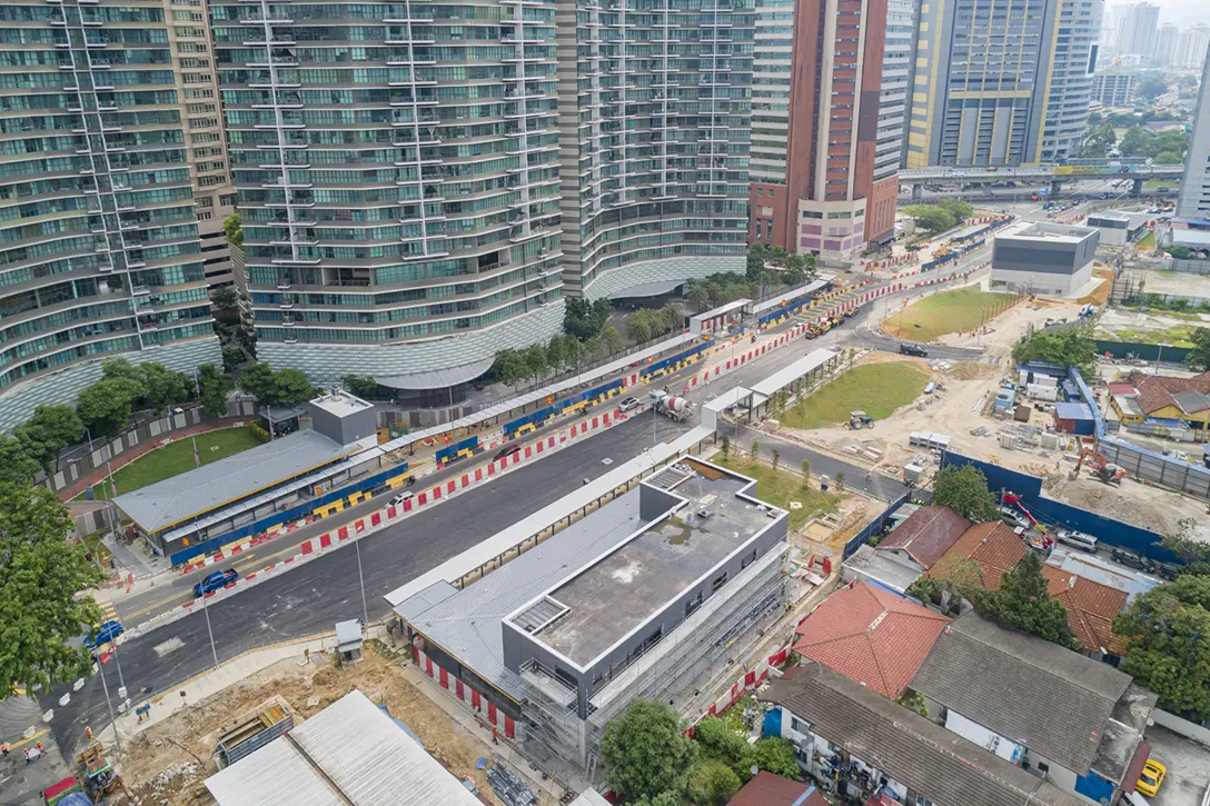 Aerial view of the ongoing road resurfacing works at the Raja Uda MRT Station along Jalan Raja Muda Abdul Aziz.