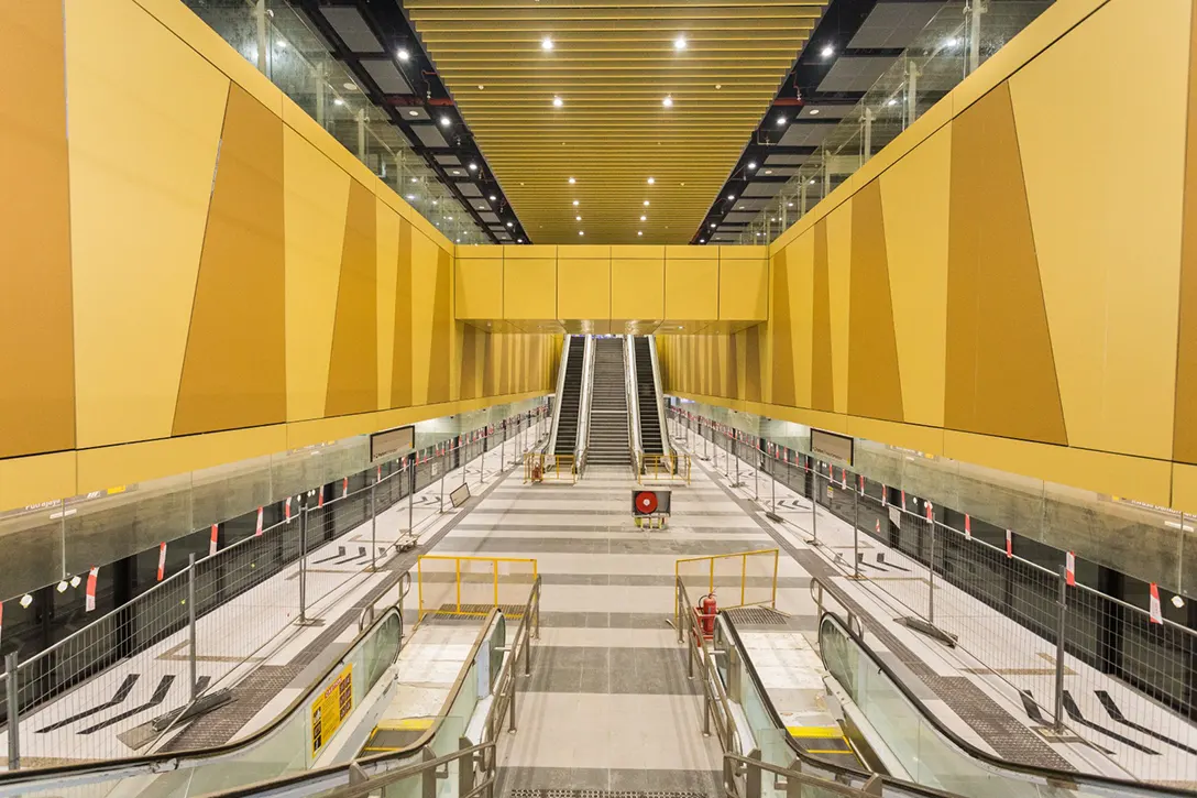 Completed finishes at the concourse and platform levels of the Raja Uda MRT Station.