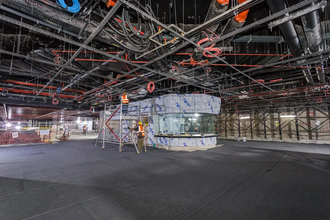 View of the Sentul Barat MRT Station concourse level showing the fit out of the customer service office being done