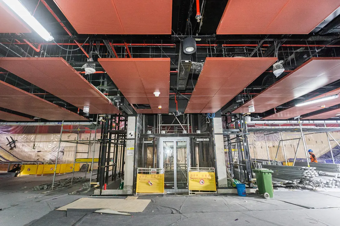 Sentul Barat MRT Station lower concourse level glass lift installation in progress.