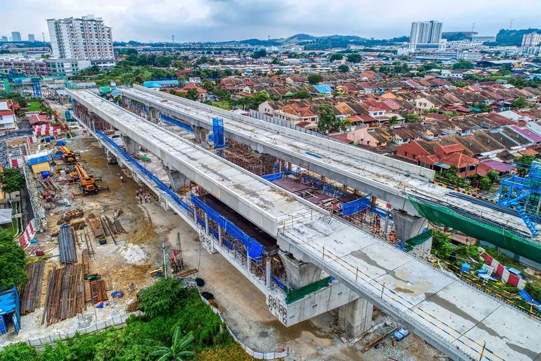 Aerial view of the Serdang Jaya MRT Station showing the reinforced concrete slabs for system and non-system rooms in progress.