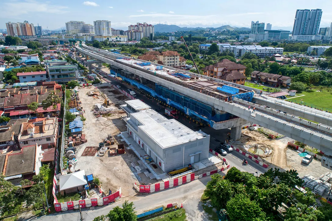 Aerial view of the Serdang Jaya MRT Station site showing the concourse level architectural works in progress.