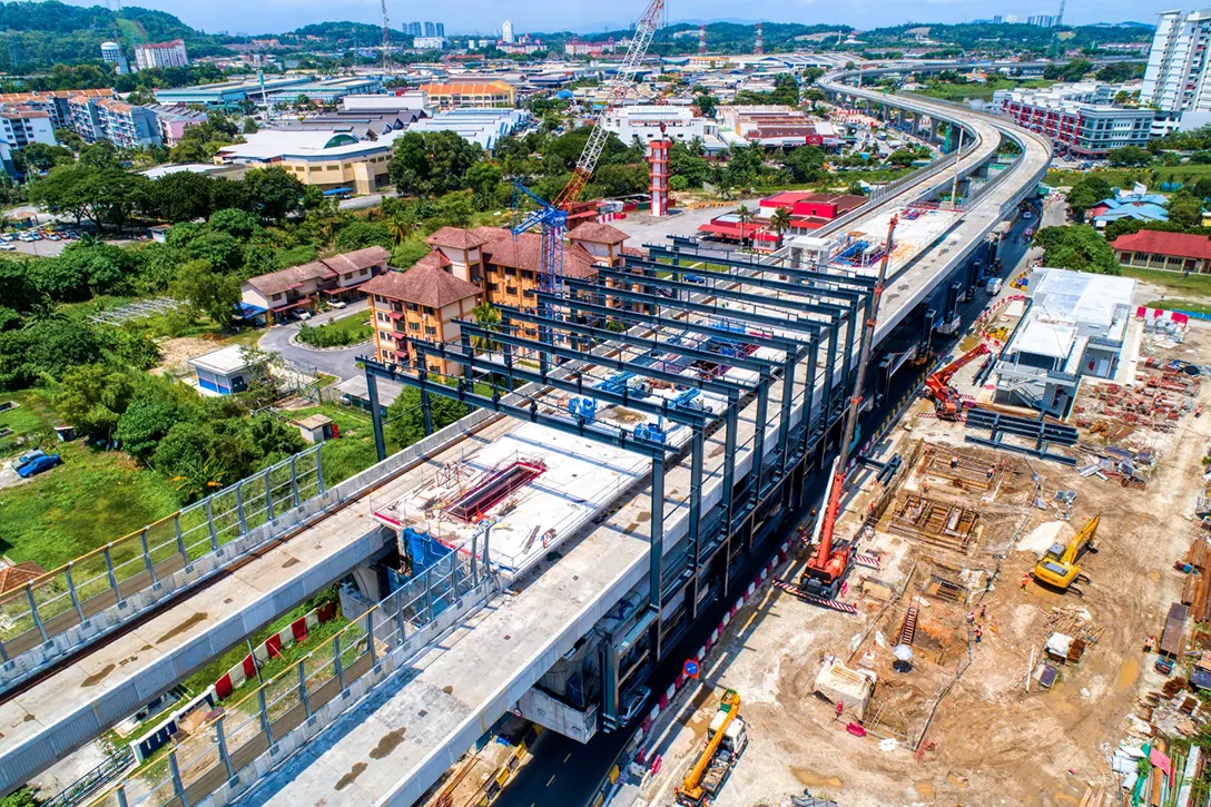 Aerial view of the Serdang Jaya MRT Station site showing the roof steelwork erection in progress.