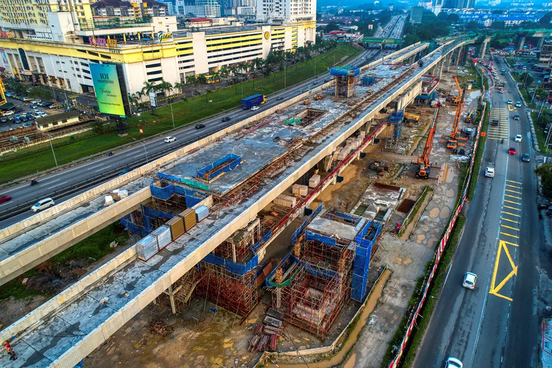 Aerial view of the construction of Serdang Raya Selatan MRT Station roofing in progress.