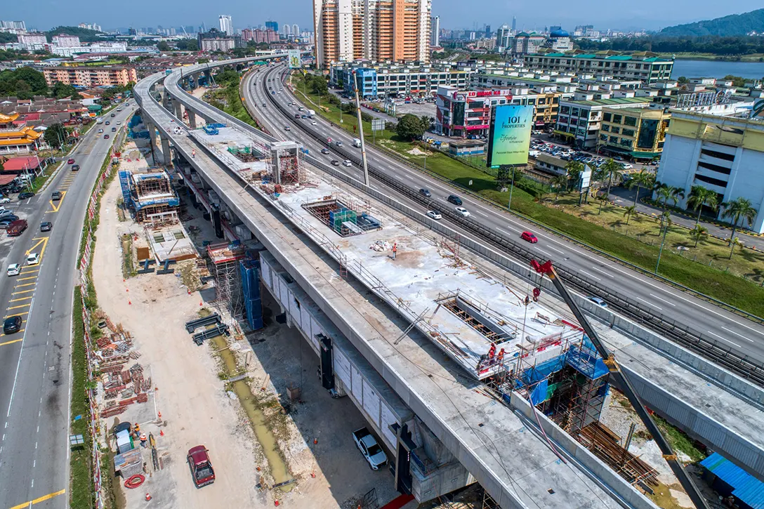 Aerial view of the post-tensioning works at platform in progress at the Serdang Raya Selatan MRT Station site.