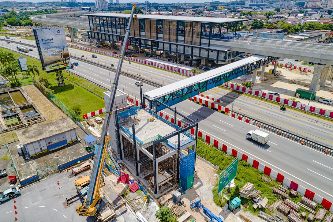 Aerial view of the Pedestrian Overhead Bridge of Serdang Raya Selatan MRT Station showing the structural works in progress.