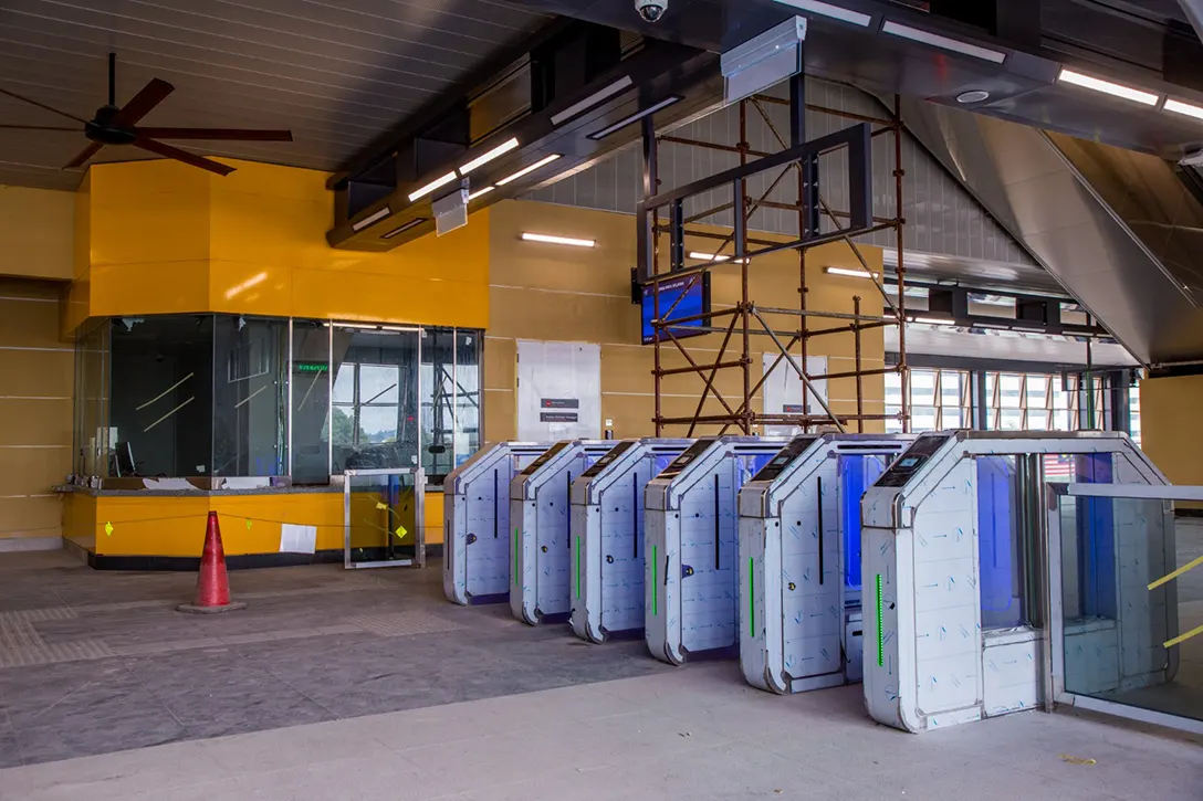 View of the Serdang Raya Selatan MRT Station concourse level showing the access control system installation in progress.
