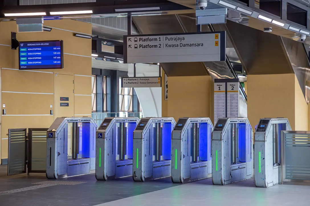 Testing and commissioning of Automatic Fare Collection gate system in progress at the Serdang Raya Selatan MRT Station.