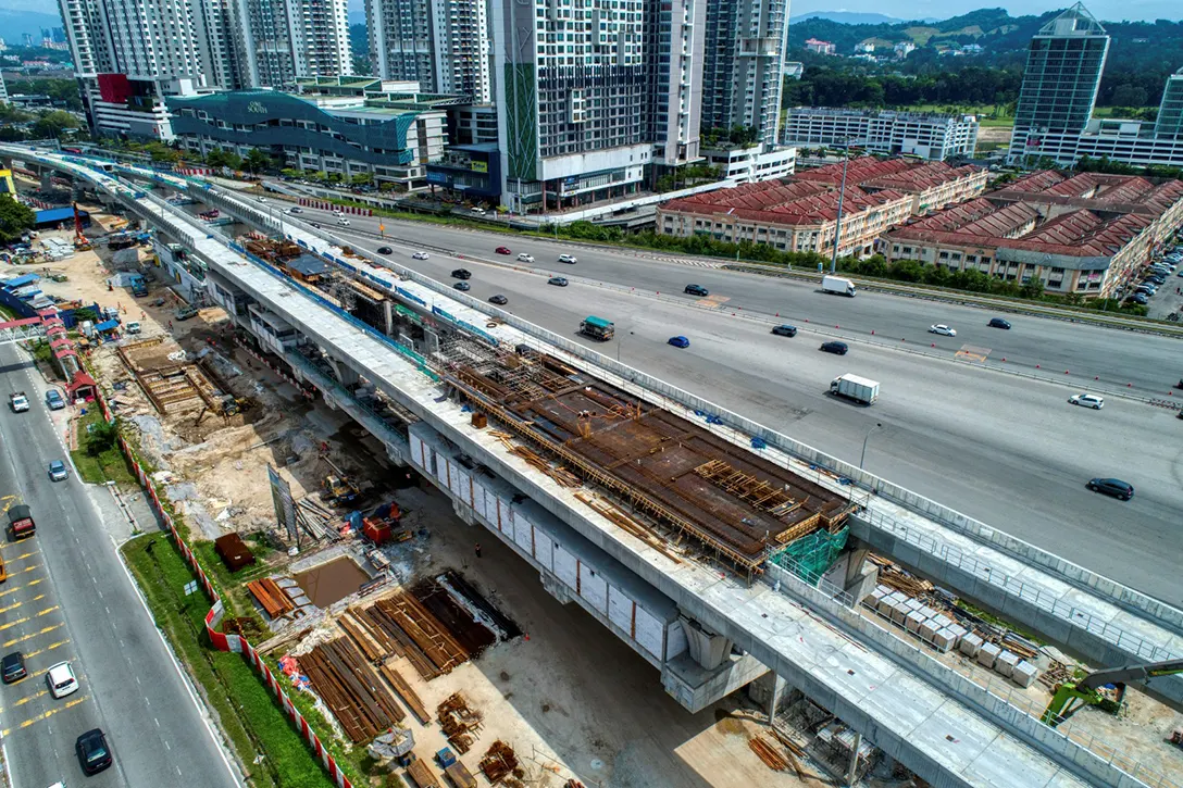 Aerial view of the installation of cable hanger in progress at the Serdang Raya Utara MRT Station.