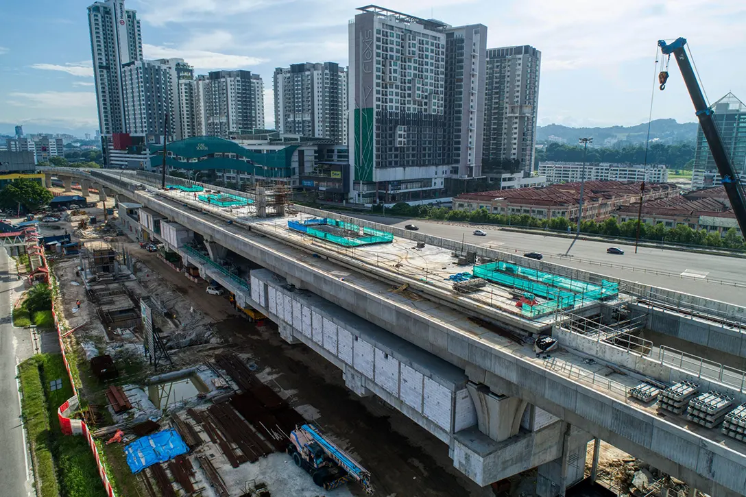 Aerial view of the Serdang Raya Utara MRT Station site showing the reinforced concrete works in progress.