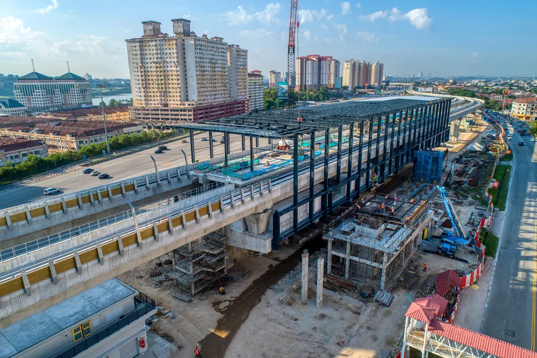 Aerial view of the Serdang Raya Utara MRT Station showing the roof installation works in progress.