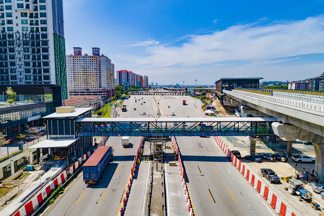 Aerial view of the Pedestrian Overhead Bridge of Serdang Raya Utara MRT Station showing the painting works in progress