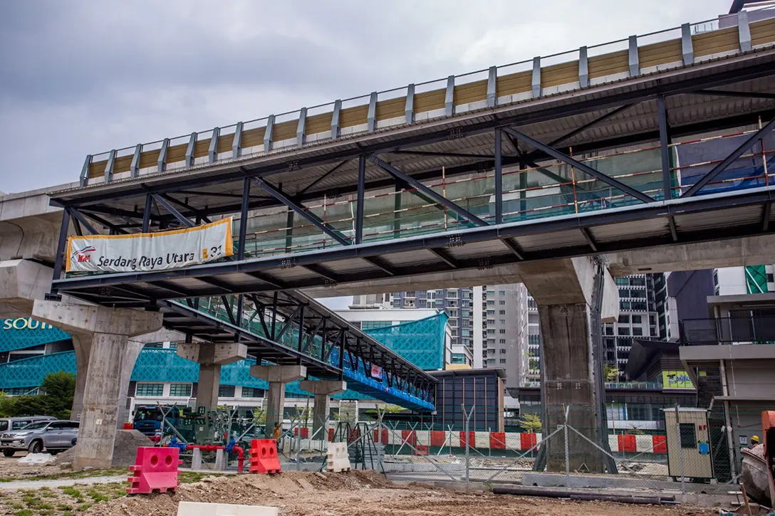 Roof finishes and bondek reinforced concrete slab in progress at the Serdang Raya Utara MRT Station Pedestrian Overhead Bridge.