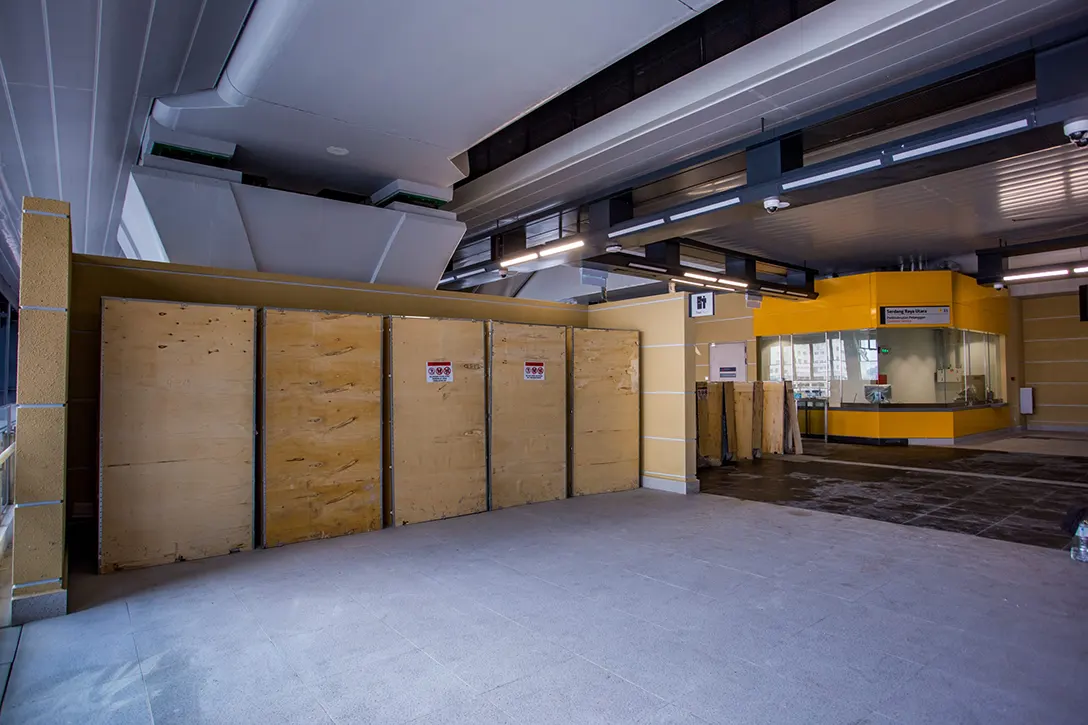 View of the Serdang Raya Utara MRT Station showing the ticketing machine installation works in progress.