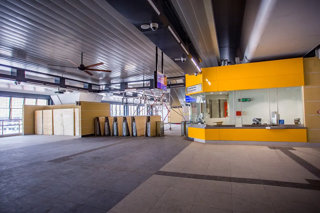 View of the Serdang Raya Utara MRT Station showing the installation of automatic fare collection in progress.
