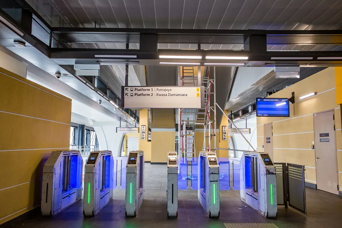 Testing and commissioning of Automatic Fare Collection gate system in progress at the Serdang Raya Utara MRT Station.