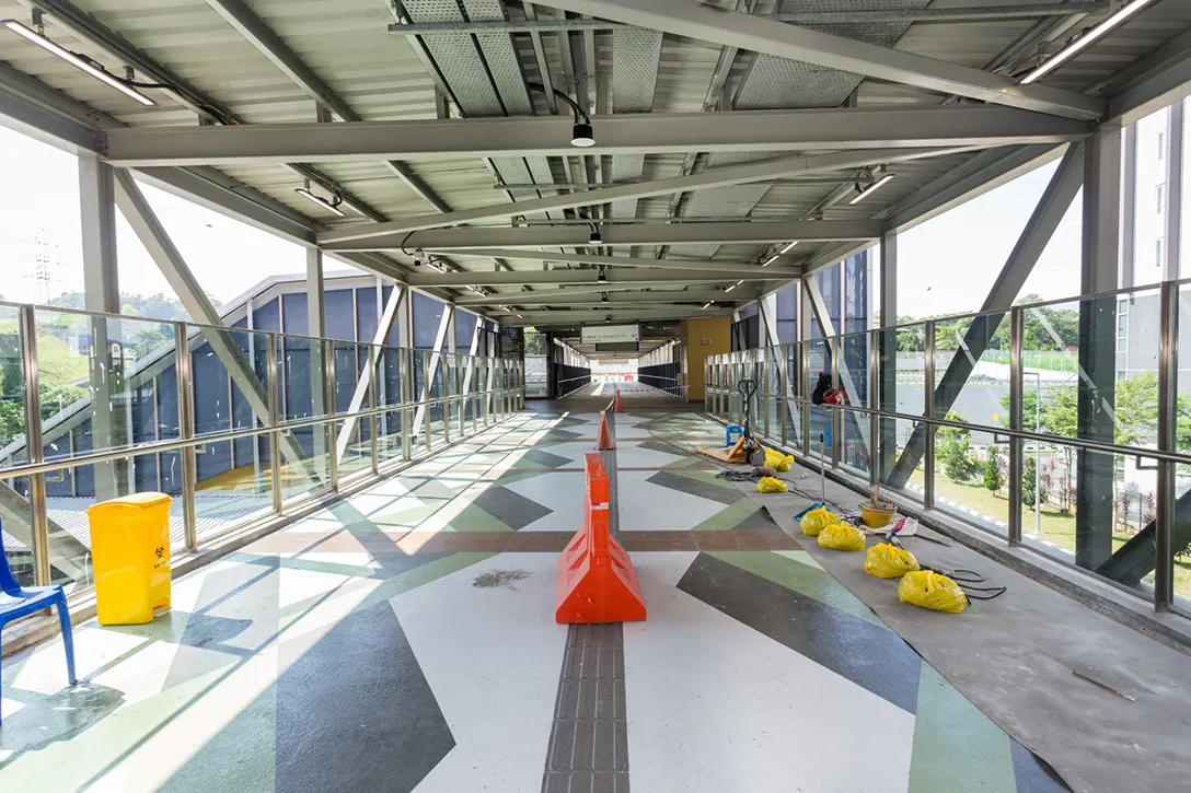 Housekeeping works in progress at the Pedestrian Overhead Bridge of the Sri Damansara Barat MRT Station