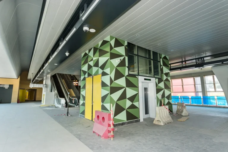 Lift mural painting in progress inside Sri Damansara Barat MRT Station