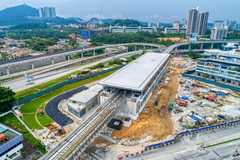 Aerial view of the Sri Damansara Sentral MRT Station site showing the tiling works at concourse level and external works in progress