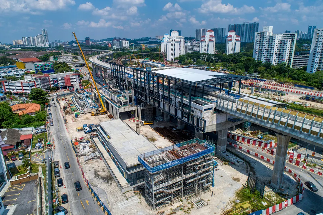 Aerial view of the Sungai Besi MRT Station site showing station works, sewerage and manhole works in progress.