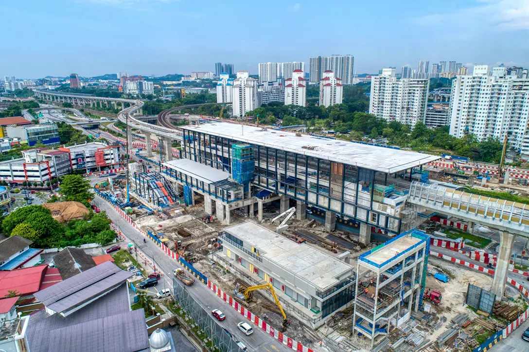 Aerial view of the Sungai Besi MRT Station site showing station works, sewerage and manhole works in progress.