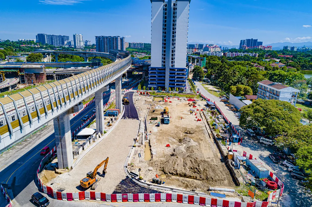 Aerial view of the at-grade park and ride for Sungai Besi MRT Station showing the preparation for trimming subgrade level in progress.