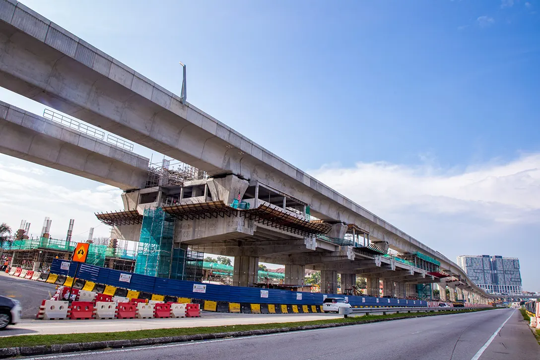 Construction of station rooms and installation of handrailing in progress at the Taman Equine MRT Station site.