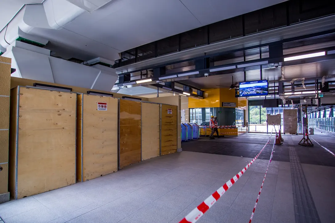 Installation of ticketing vending machine in progress at the Taman Equine MRT Station.