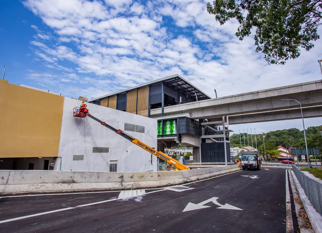 Painting works in progress for Taman Equine MRT Station Entrance 1 external wall.