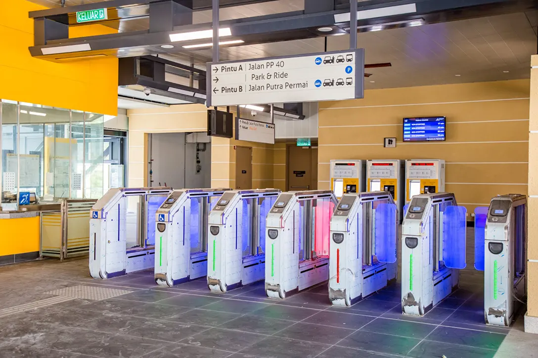 Testing and commissioning of Automatic Fare Collection gate system in progress at the Taman Equine MRT Station.