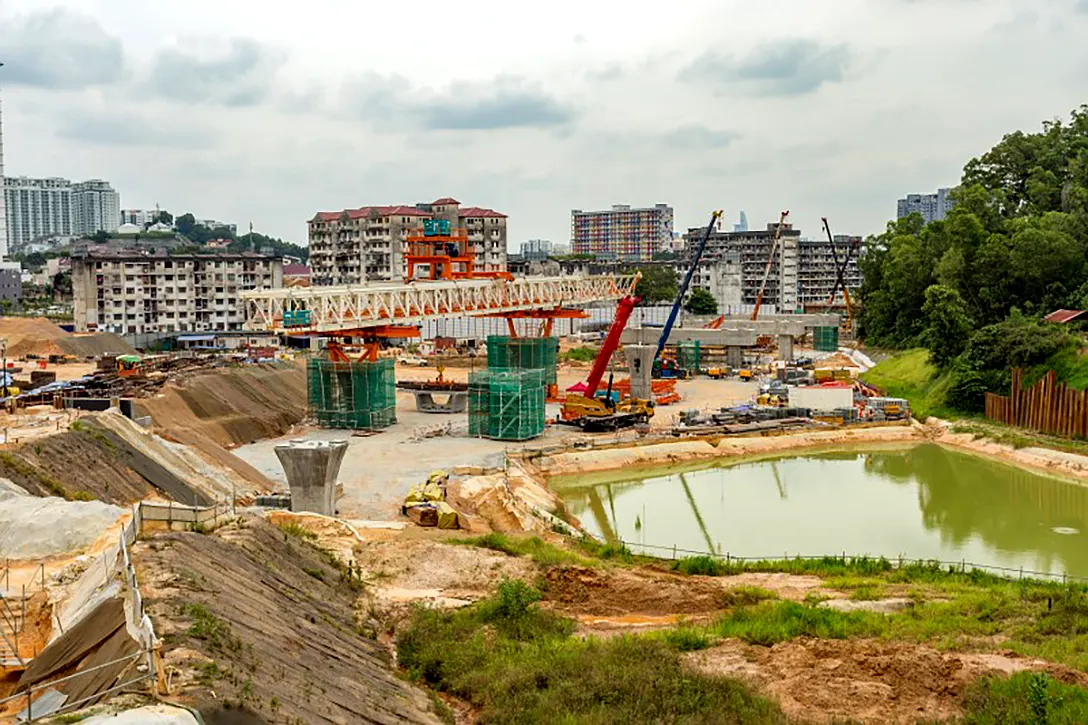 Erection of launching gantry at the Taman Naga Emas MRT Station site.