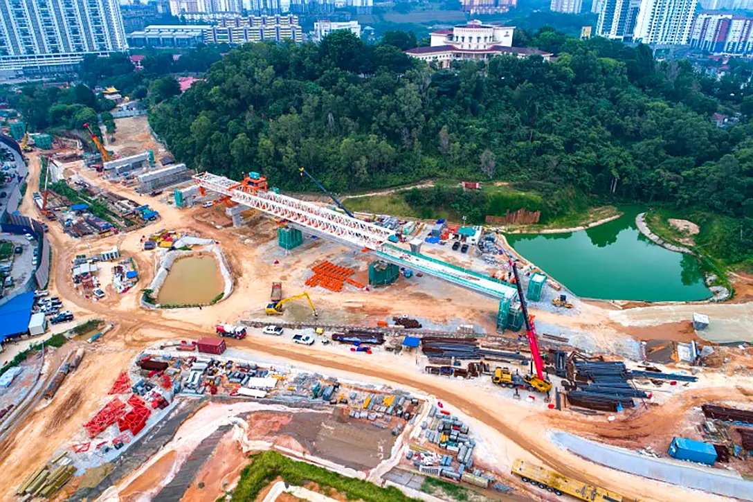 Aerial view of segmental box girder launching at the Taman Naga Emas MRT Station site.