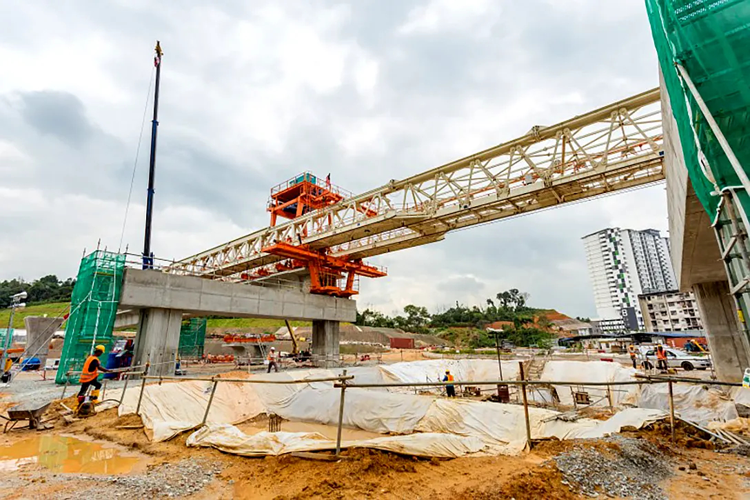 Segmental box girder launching at the Taman Naga Emas MRT Station site.