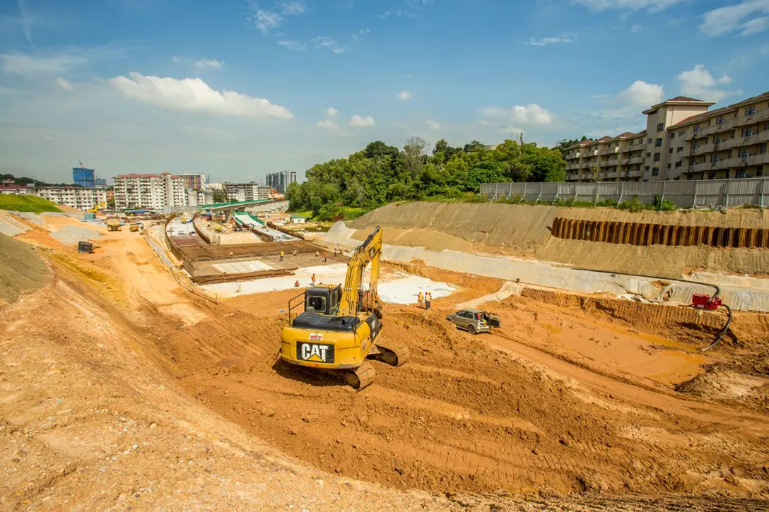 Ongoing piled slab and reinforced concrete U-trough slab works at the Taman Naga Emas MRT Station site.