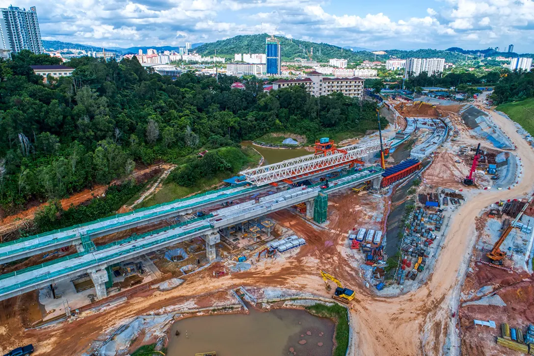 Ongoing launching of segmental box girder and station concourse works at the Taman Naga Emas MRT Station site