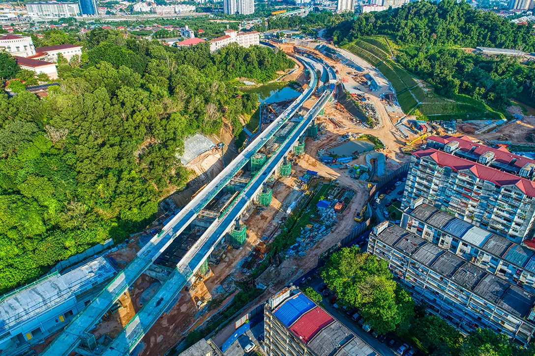 Aerial view of the Taman Naga Emas MRT Station site showing the station intermediate level works in progress.