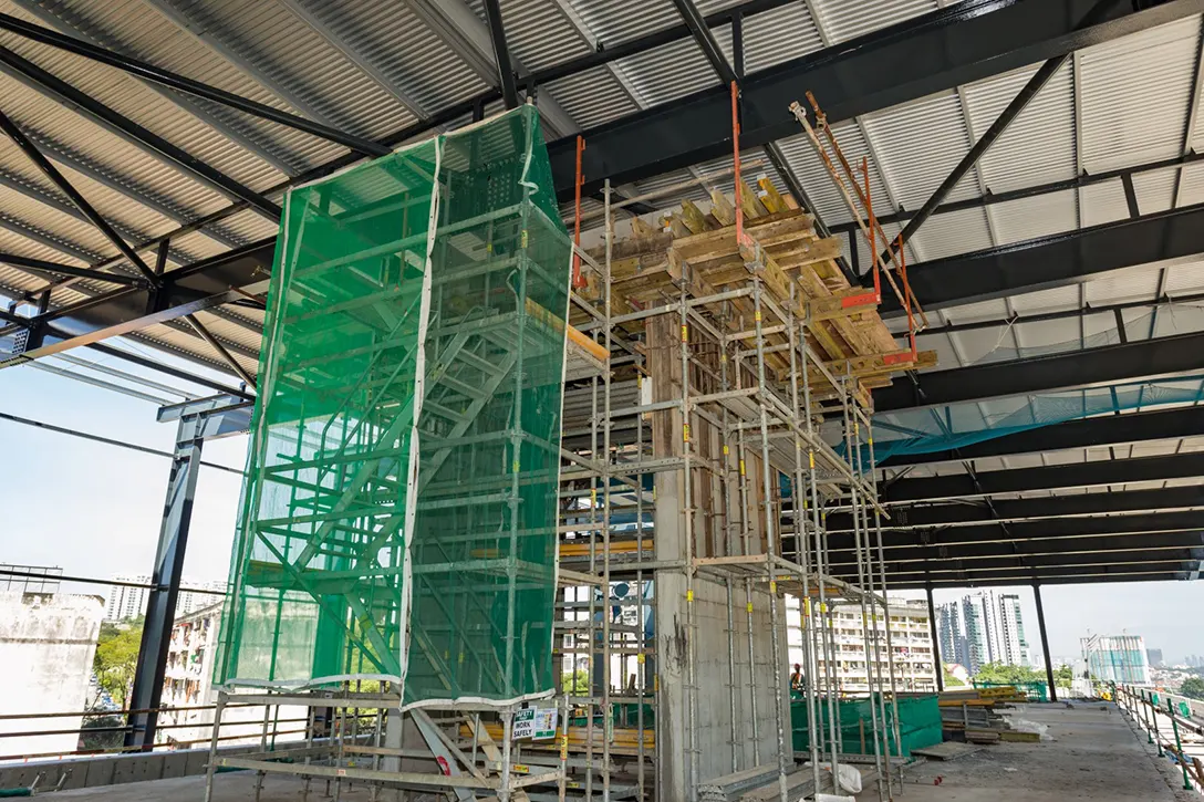 View of the ongoing lift shaft structure at the Taman Naga Emas MRT Station.