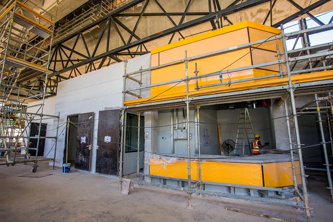 Installation of external façade at Customer Service Office room in progress at Taman Naga Emas MRT Station.