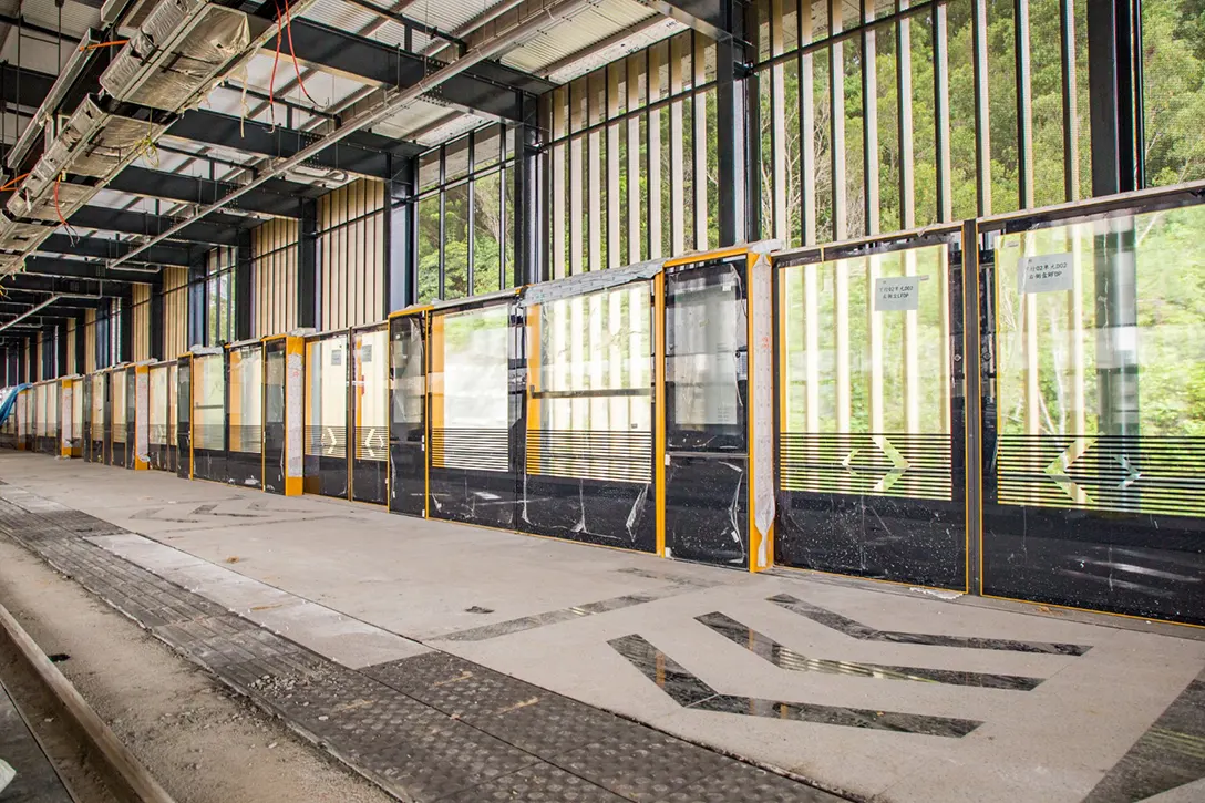 Tiling and Automatic Platform Gate works in progress at the platform level of the Taman Naga Emas MRT Station.