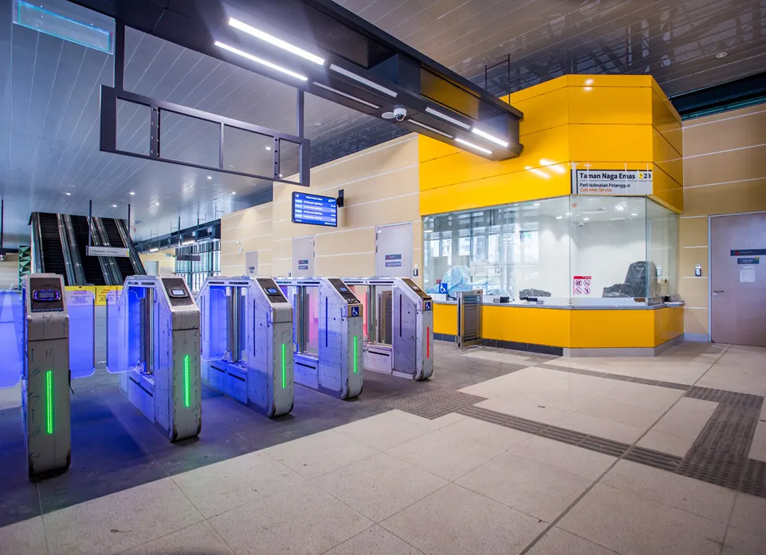 Testing and commissioning of Automatic Fare Collection gate system in progress at the Taman Naga Emas MRT Station.