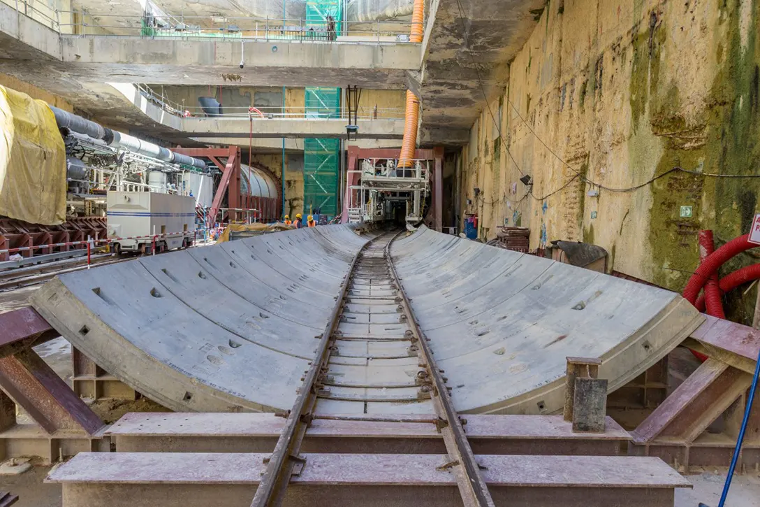 View of the locomotive rails which transport supplies for Tunnel Boring Machines mining operation activities at the Titiwangsa MRT Station site.