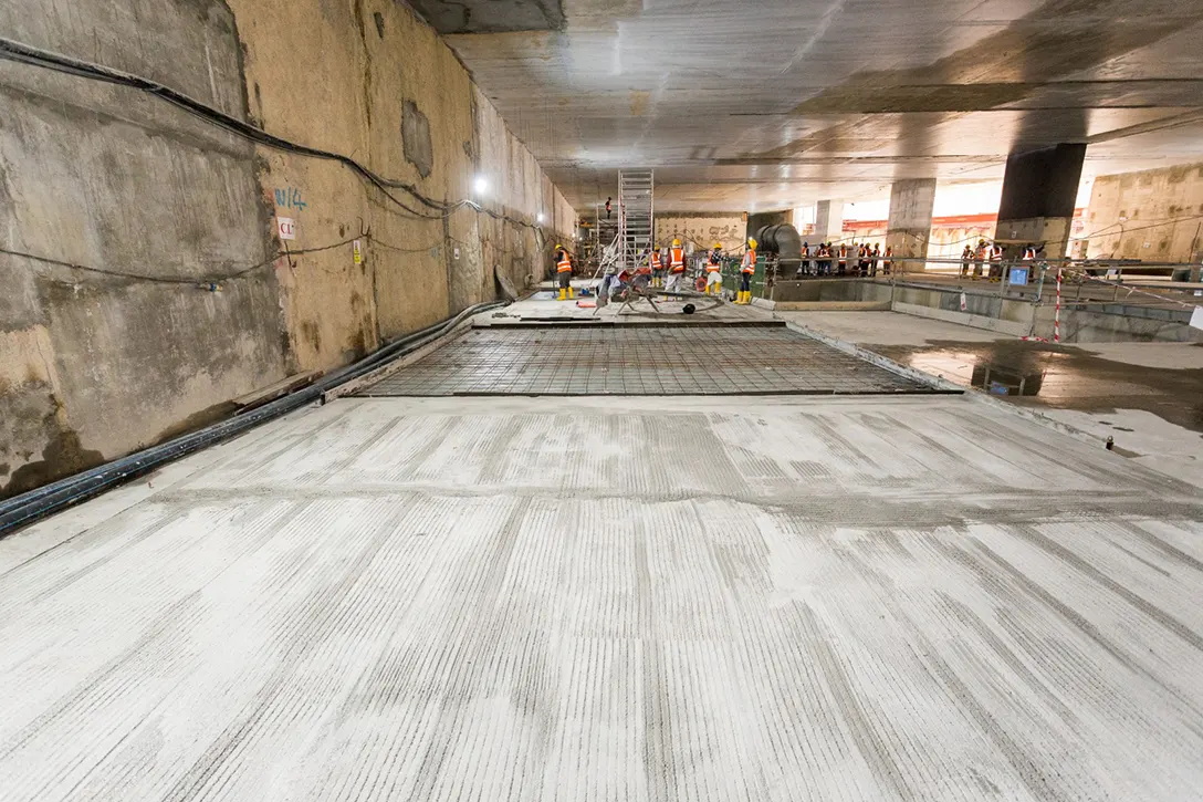 Screeding works prior to tiling works at the Titiwangsa MRT Station concourse level.