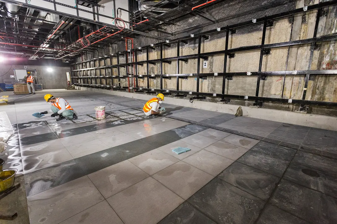 Floor tile installation works at the concourse level of the Titiwangsa MRT Station.