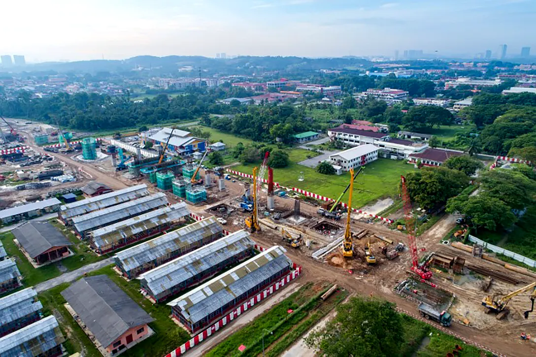 Aerial view of piers being constructed at the UPM MRT Station site.