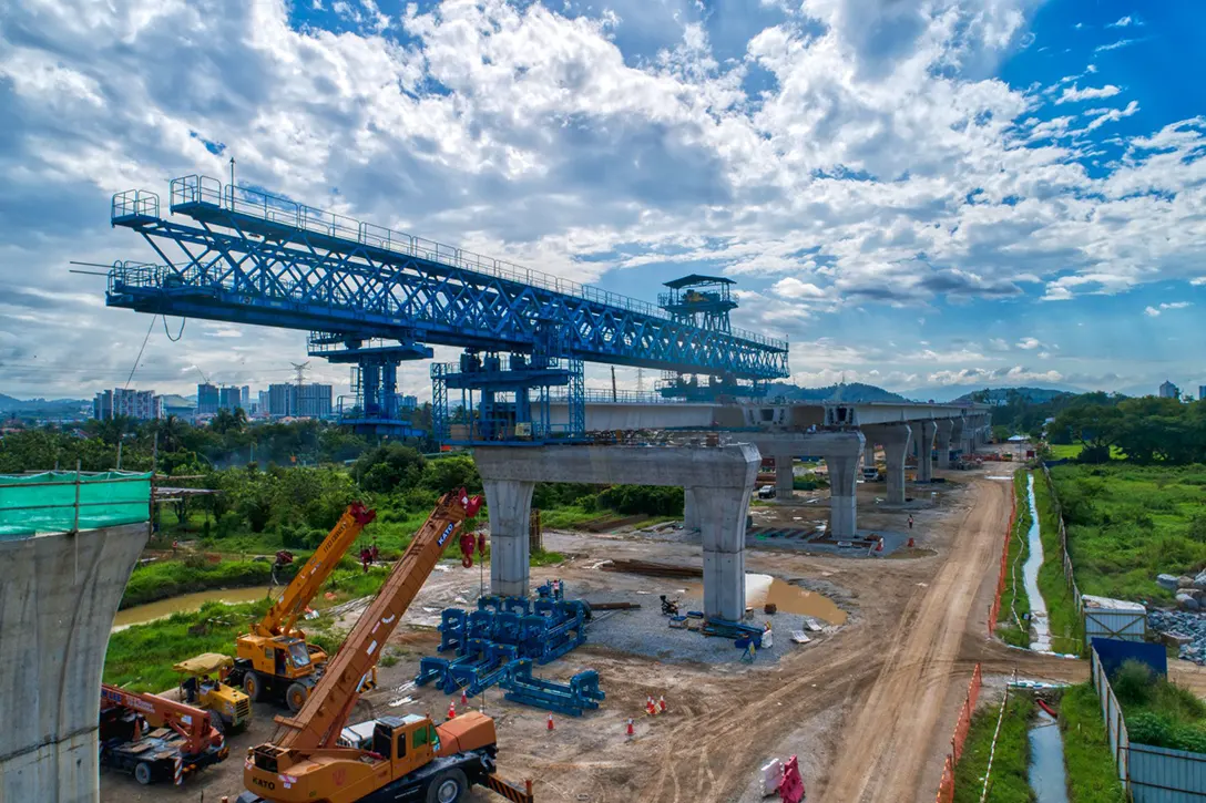 Segmental box girder launching works at the pocket track area at the UPM MRT Station site.