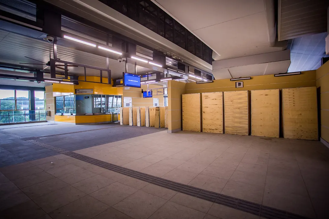 View inside the UPM MRT Station showing the installation of ticket vending machine in progress.