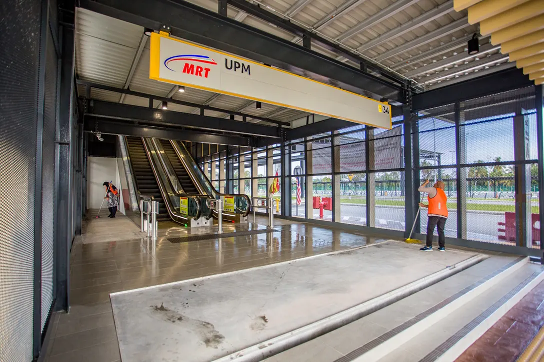 Housekeeping works in progress at the UPM MRT Station entrance.