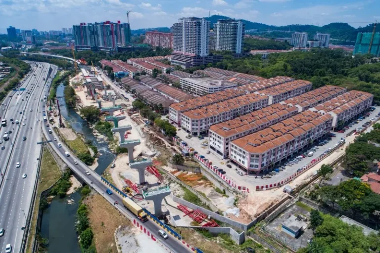 Aerial view of tendon stressing of precast t-shape piers at the Damansara Damai MRT Station site