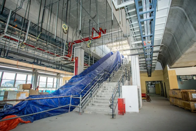 Installation of staircase balustrade and ceiling frame installation in progress at the Damansara Damai MRT Station